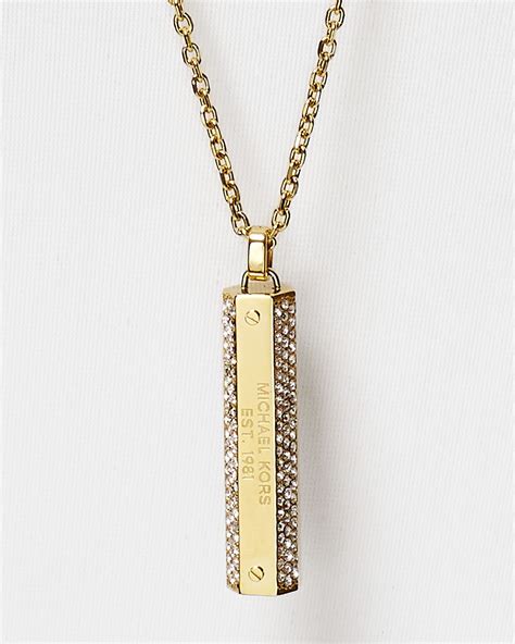 michael kors initial necklace.